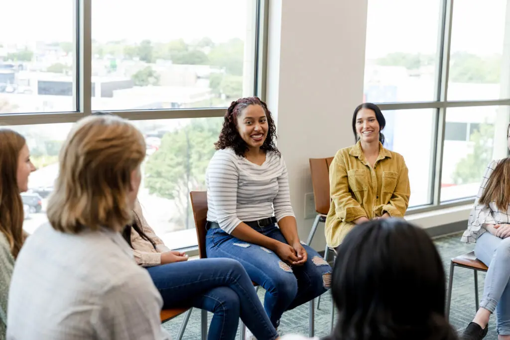 What is the difference between a partial hospitalization program and an intensive outpatient program?