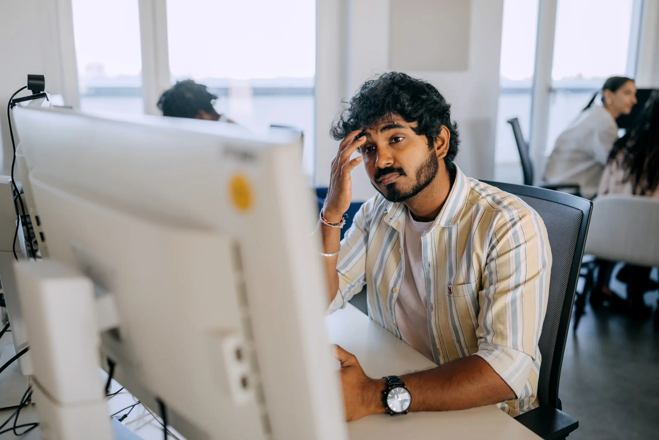 Man staring at his computer